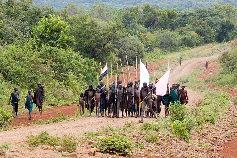 107   A rivaling surma group arrives for the donga stick fighting